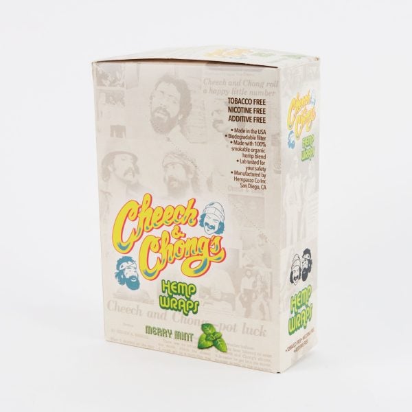 A box of Hemp Blunt Wraps - Grandaddy Grape, tobacco-free and nicotine-free, featuring portraits of Cheech & Chong with product descriptions and flavors like "Grandaddy Grape" indicated.