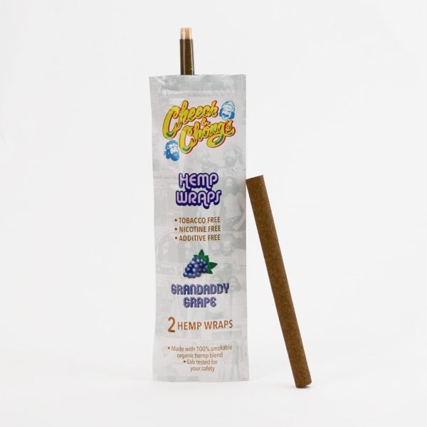 A pack of Hemp Blunt Wraps - Grandaddy Grape hemp blunt wraps titled "Granddaddy Grape" with a loose wrap leaning against it. The packaging indicates the wraps are tobacco, nicotine.